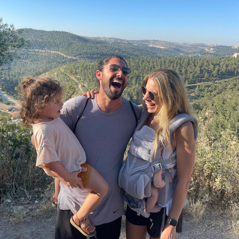 smiling family in nature