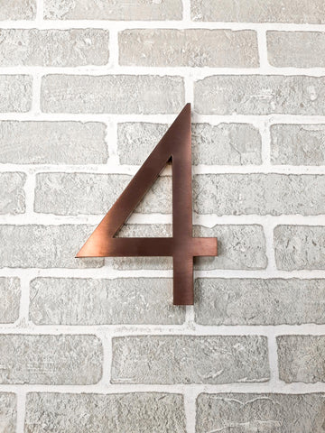 Number 4 installed on a wall
