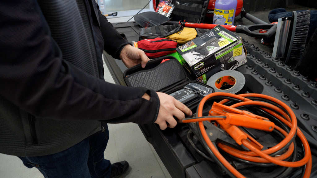 Tire Repair Plug Kit, Portable Air Compressor, Jumper Cables and a Jump Pack