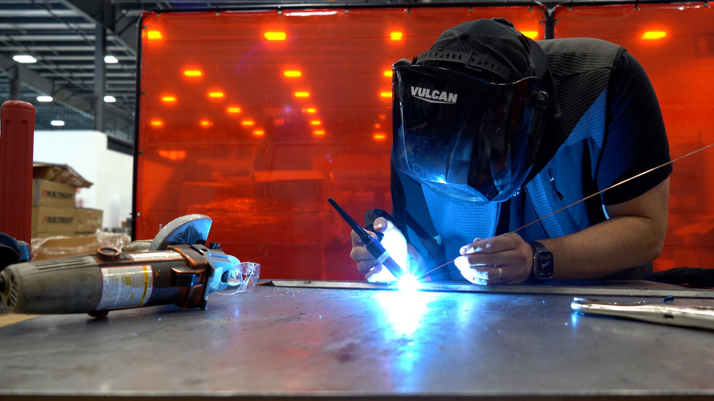 Matt tack welds the top flange on the seat bottom divider for added rigidity.