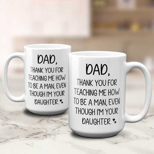https://cdn.shopify.com/s/files/1/0452/5883/4070/products/dad-gift-from-daughter-thanks-for-teaching-me-to-be-man-funny-dad-coffee-mug-cup_512x512.jpg?v=1669791973