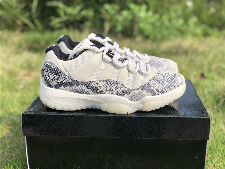 snakeskin 11s low