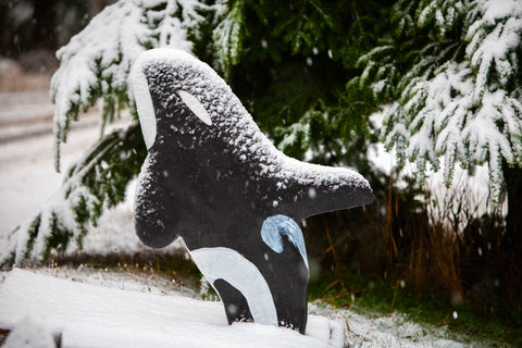 baby orcas statue snow