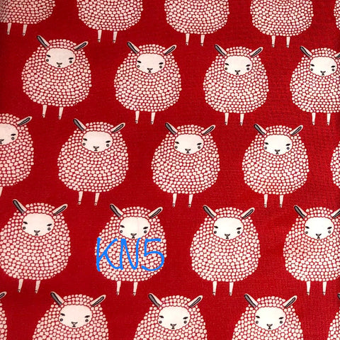 white sheep on red background