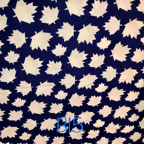 white maple leafs on blue background