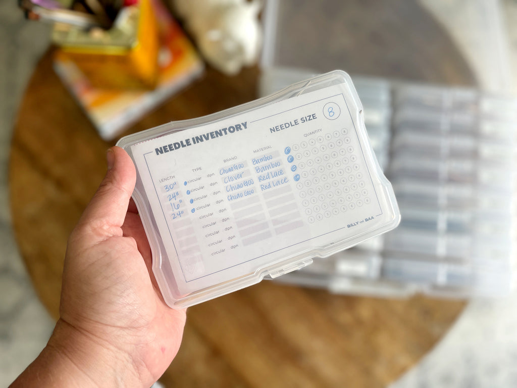 close up of a needle storage box with Billy and Baa's Needle inventory card