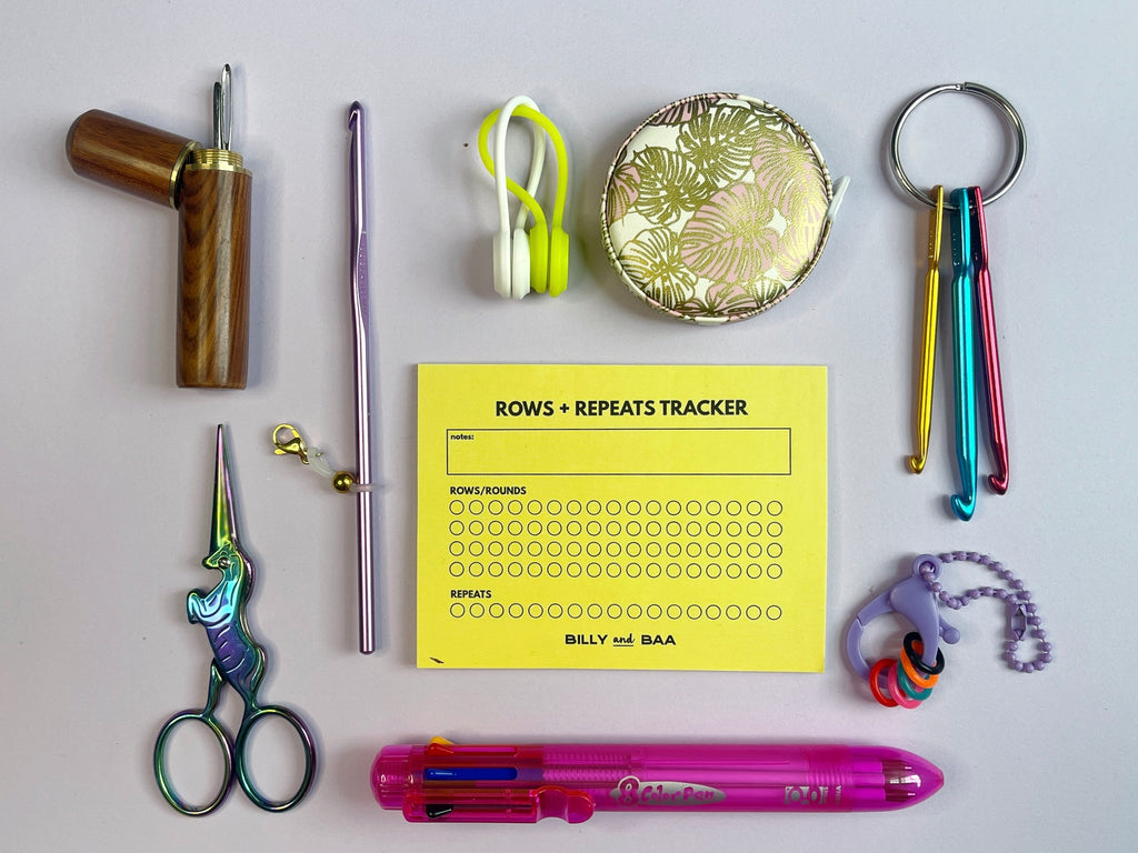 A collection of Billy and Baa's top ten travel knitting notion must haves, including scissors, tape measure, stitch markers, and more.