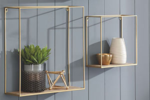 3 gold accent wall shelves