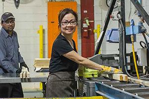 DeFehr furniture makers in their Winnipeg shop 