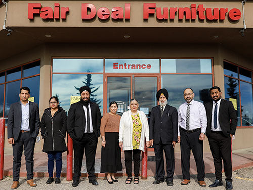 The Fair Deal team outside the store entrance