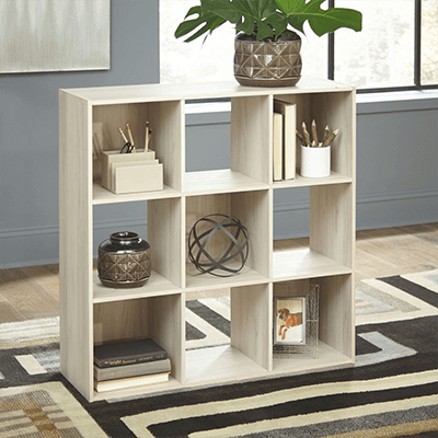 Three by three cube organizer shelf in natural wood tone