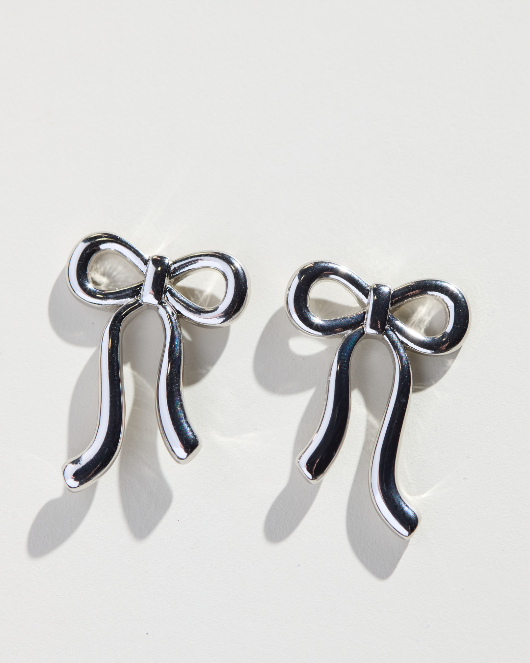 Silver Vintage Bow Stud Earring from Nickel and Suede