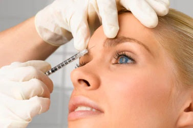 Woman having botox treatment done