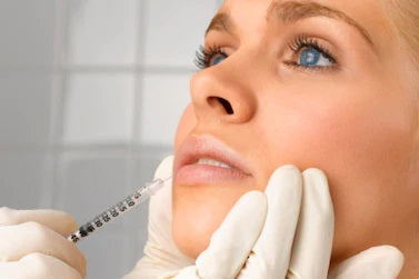 Woman getting dermal fillers