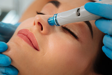 Patient receiving a Hydrafacial