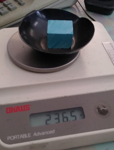 synthetic turquoise being weighed