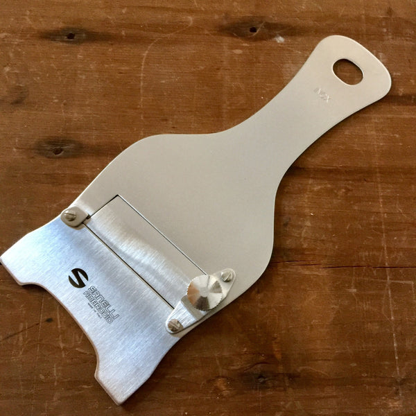 https://cdn.shopify.com/s/files/1/0455/3339/7144/products/truffle-slicer-plain-blade.jpg?v=1599790454&width=600