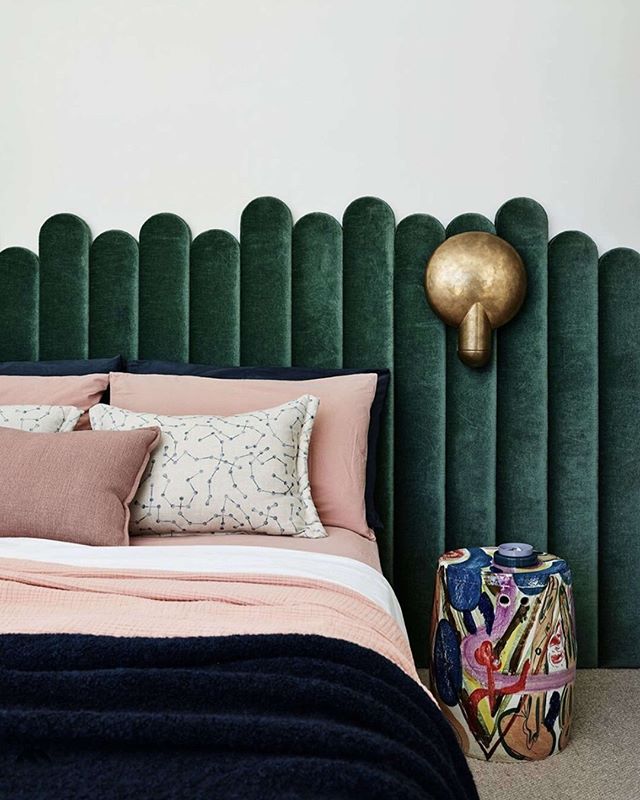 Velvet green headboard with pink bed