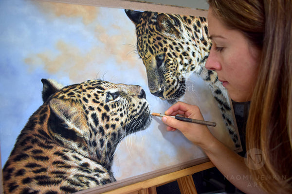 Wildlife artist Naomi Jenkin drawing her Leopard art titled "Eye to Eye".