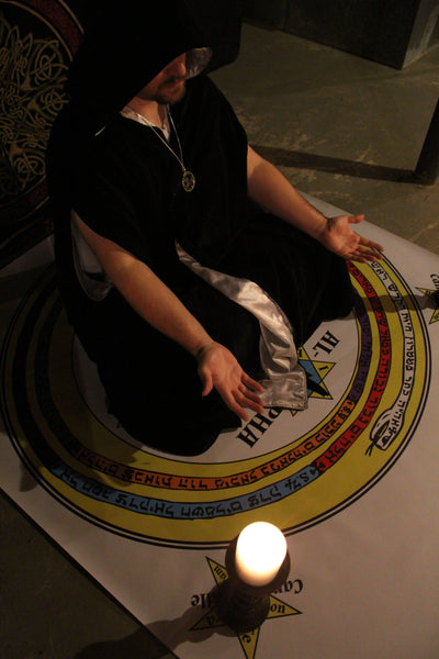 Ceremonial Magician in the summoning circle of the Lesser Key of Solomon