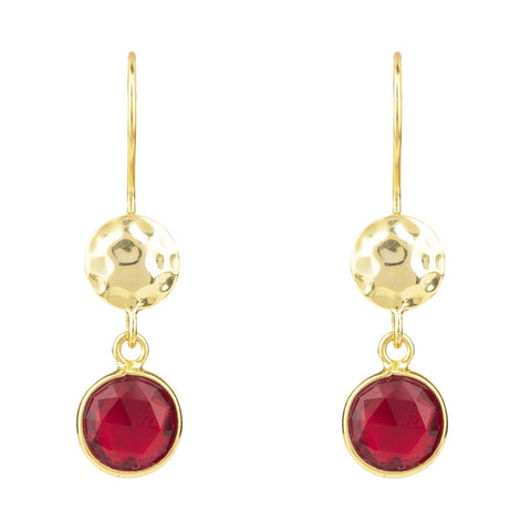 Garnet drop hoop earrings against a clear background