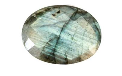 Laboradorite crystal against a clear background