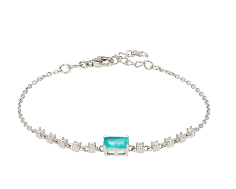 Paraiba Tourmaline bracelet with silver finish against a clear background.