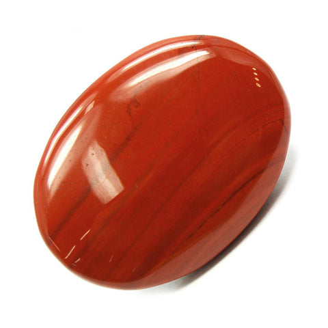Red Jasper crystal against a clear background