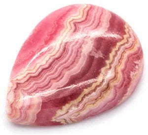 Rhodochrosite crystal against a clear background