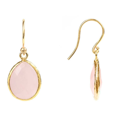 Rose Quartz earrings against a clear background. Rose Quartz is known for its spiritual properties.