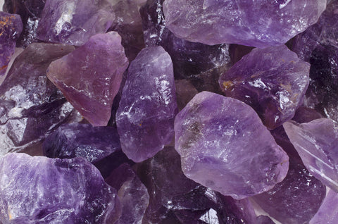 Many large amethyst crystals are visible in this photo.