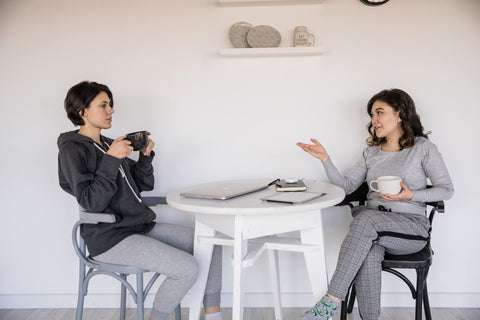 Friends sharing a coffee together