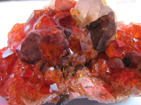 A large garnet crystal is visible. Garnet is a perfect crystal for love and marriage.