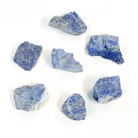 Lapis Lazuli rough stone on a white background