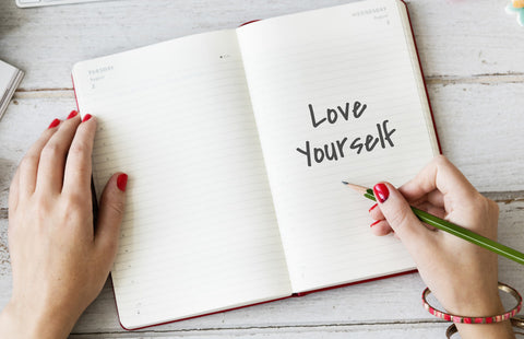 Self-Compassion helps  you to love yourself as shown in this picture.