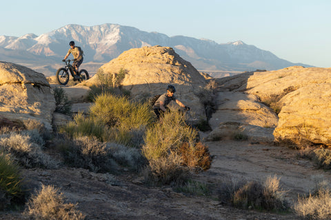 Two Guys on Bakcou eBikes Riding on a Desert Mountain Bike Trail