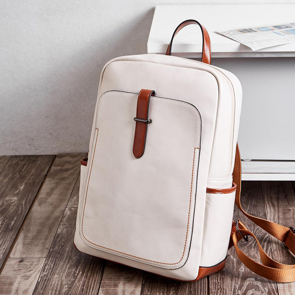 small beige travel backpack