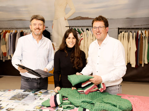 Brothers Brendan O'Sullivan (Director) and Paul O'Sullivan (Managing Director) <with Head of Design Maria-Christina McPadden, centre> with the collection designed for Create at Brown Thomas, at the IrelandsEye Knitwear factory in Baldoyle, Co Dublin.