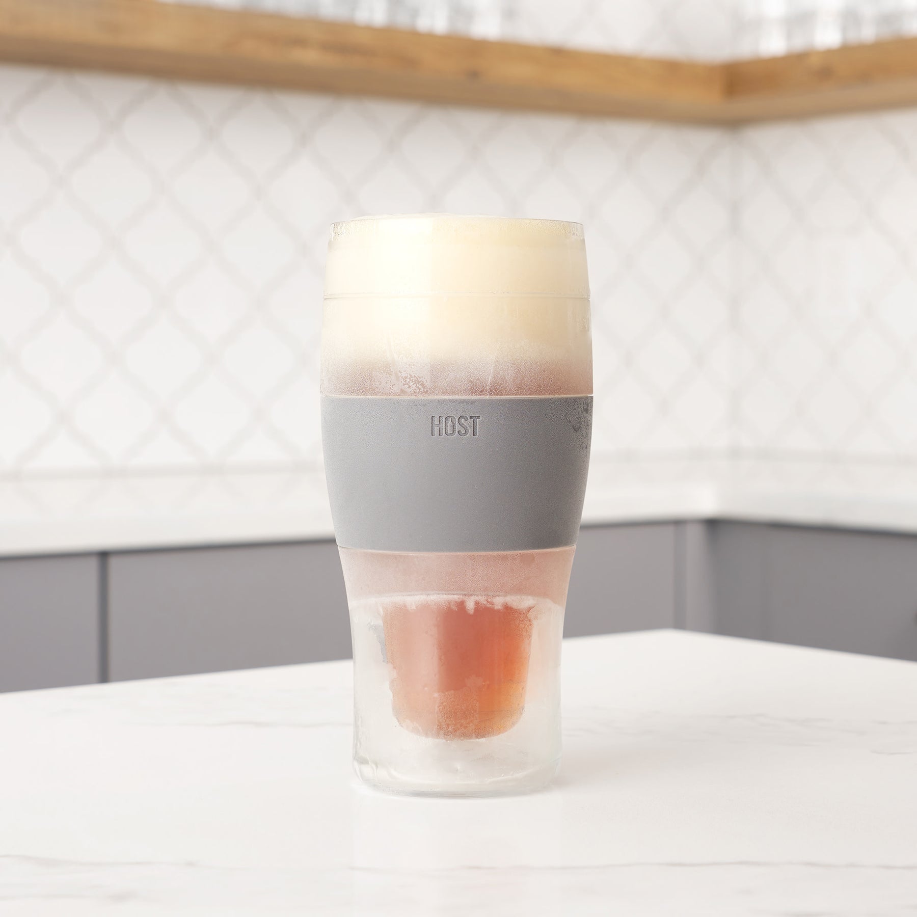 These Freeze Beer Glasses Have a Built-In Silicone Koozie Hand Grip