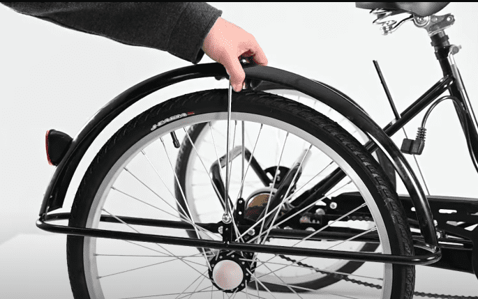 installing fenders onto the rear of adult electric tricycle