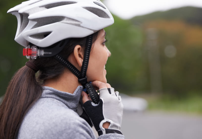 woman wearing a bicycle helmet