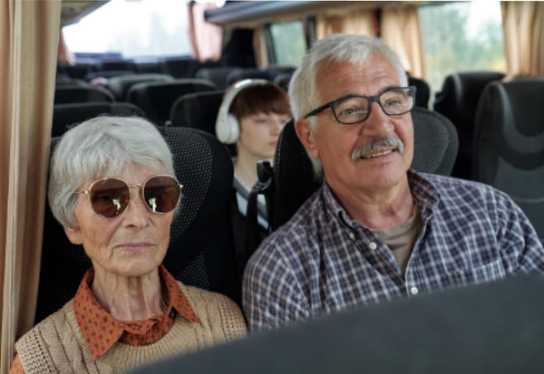 senior citizens riding public transportation