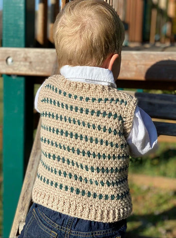 toddler in striped crochet vest