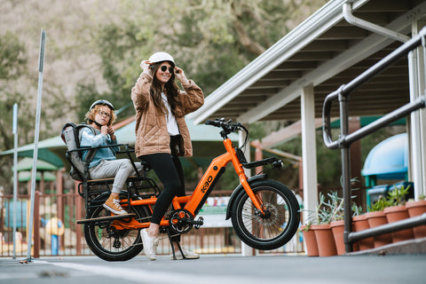 family riding carry kids