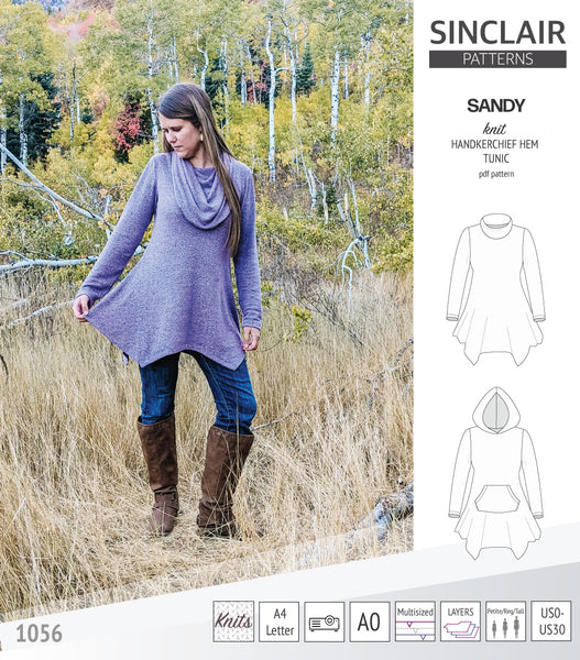 Sandy knit handkerchief hem tunic with a cowl, collar, hood and pockets ...