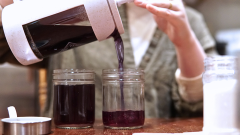 Tea Concentrate poured from Piper and Leaf Piper Press into a jar