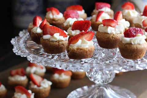 cupcakes topped with strawberries