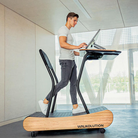 a man on a manual walking treadmill