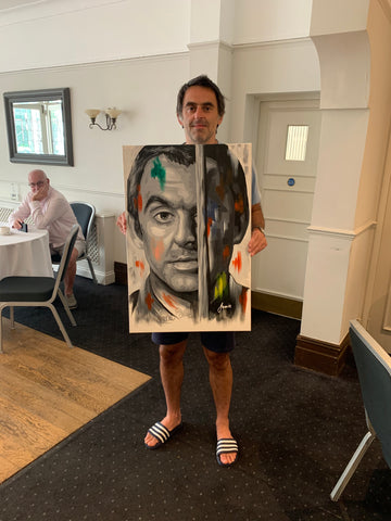 Ronnie O'Sullivan with portrait