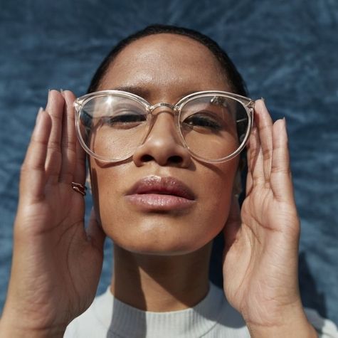 woman wearing blue light glasses